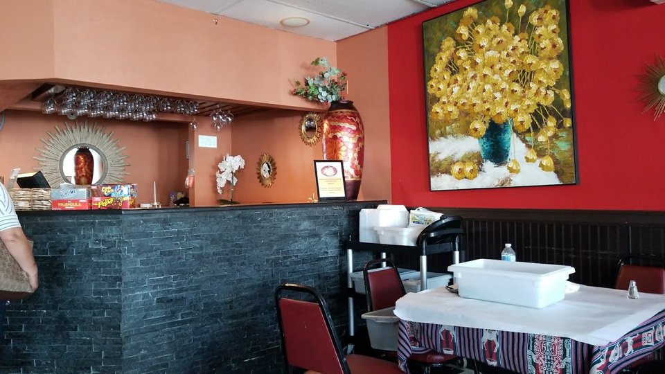 Dining area set for lunch and dinner service.
